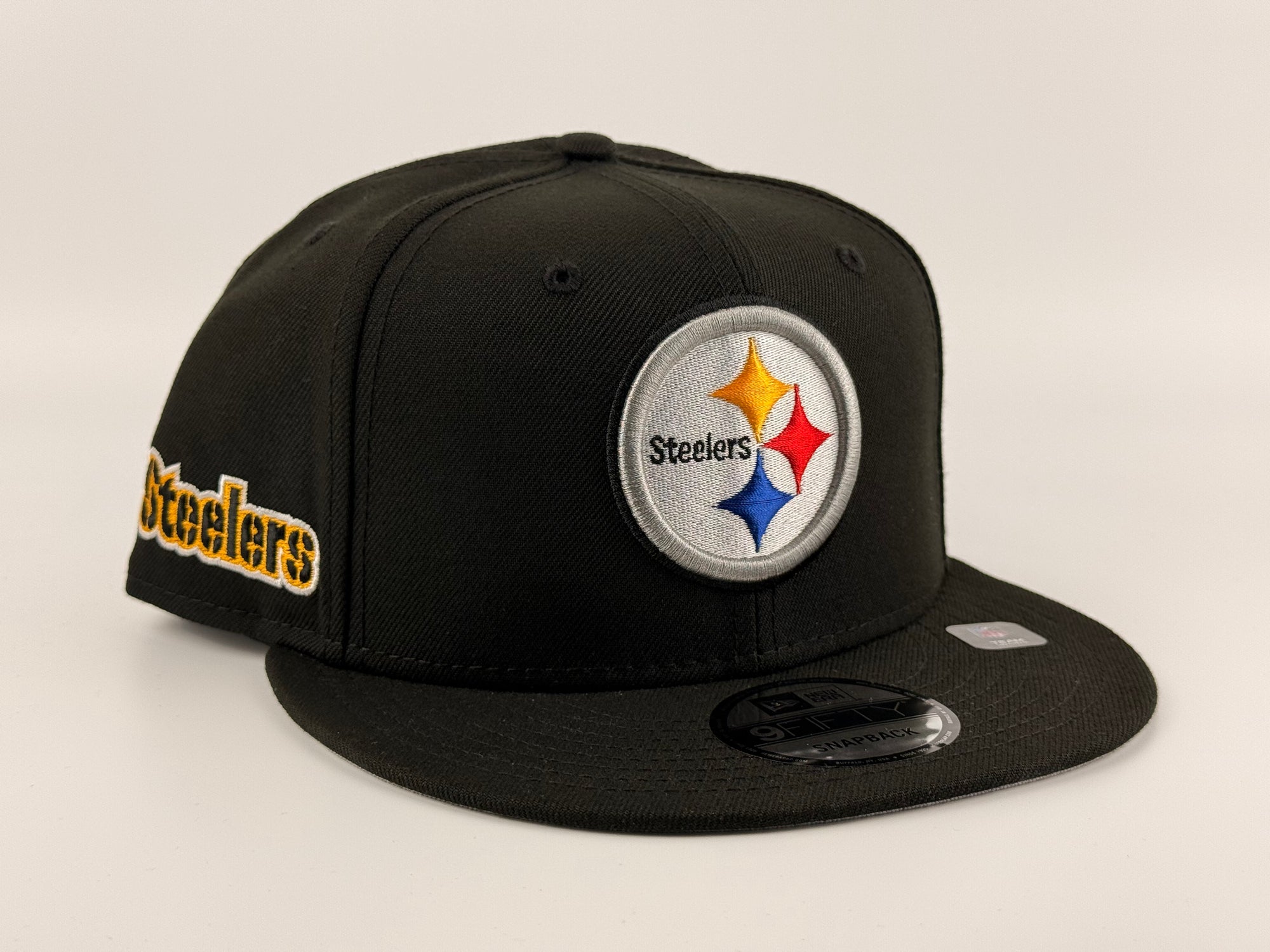 Pittsburgh Steelers New Era 950 Snapback Cap Black Steelers Side Patch